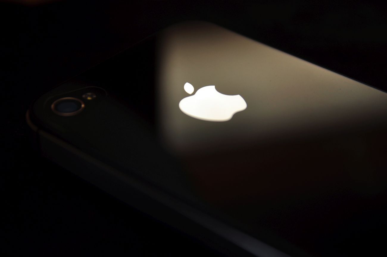 "Manila, Philippines aA February 21, 2012: Apple Inc.'s iPhone 4s product in black background."